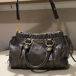 Miu Miu grey leather bag.